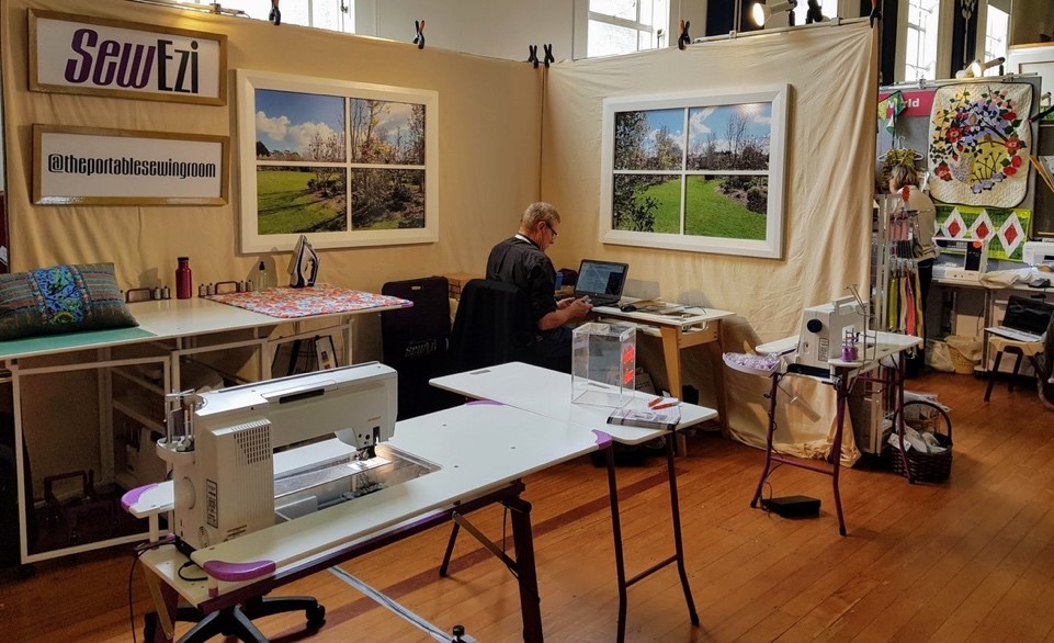 2019 SEWEZI stand at the Auckland Quilt Symposium, New Zealand  with Dave working on SEWEZI cad drawing