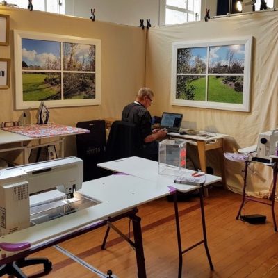 2019 SEWEZI stand at the Auckland Quilt Symposium, New Zealand  with Dave working on SEWEZI cad drawing